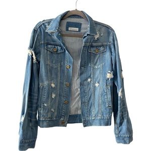 Distressed, deconstructed denim jacket by Sly, Japanese designer.
